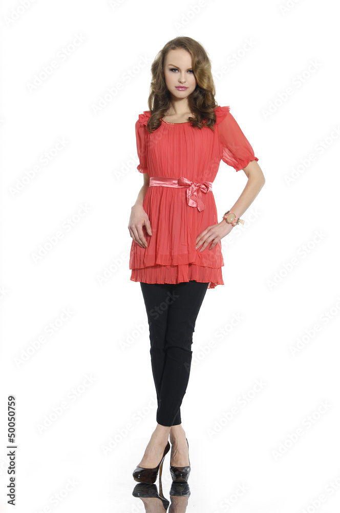 young woman in casual clothes posing for the camera young woman in casual clothes posing for the camera