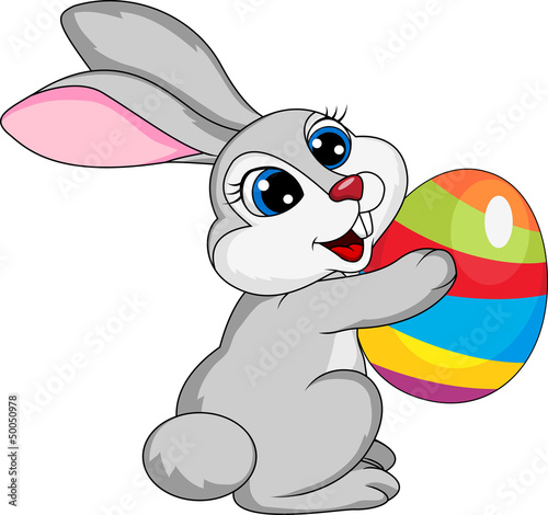 Cute rabbit holding ester egg