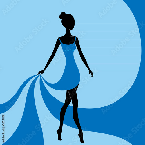 Beautiful girl in a blue dress