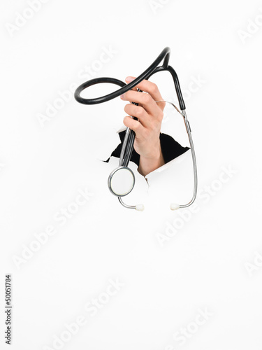 female hand holding a black stethoscope