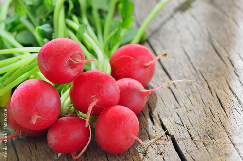 garden radish isolated on old wooden