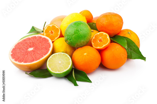 Set of fresh citrus fruits with green leaves, isolated on