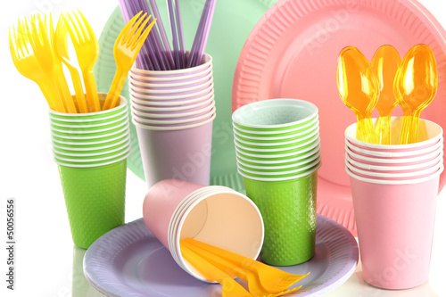 Multicolored plastic tableware close up