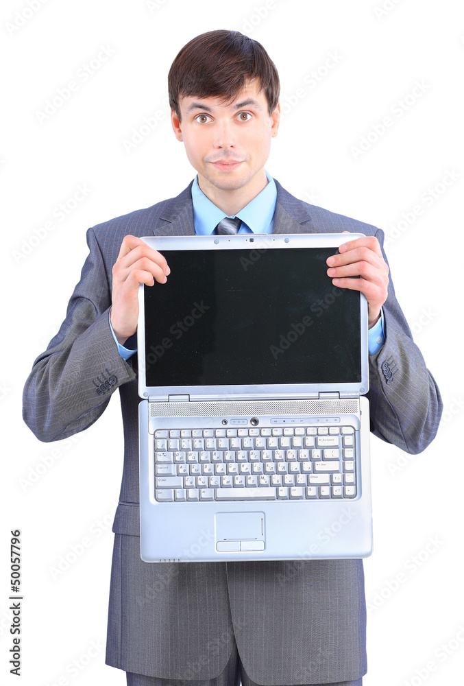 The young businessman keeps the laptop. The young businessman keeps the laptop.