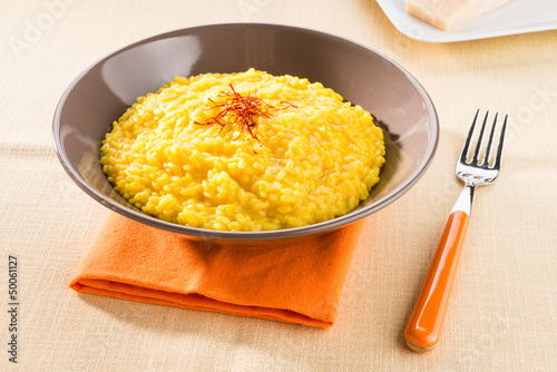 Fotografia Risotto alla milanese - Saffron rice, closeup