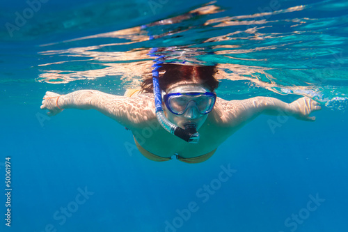 Young women at snorkeling in the Andaman sea