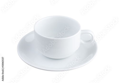 An empty tea or coffee cup with causer