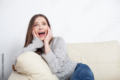 Woman screams while watching tv