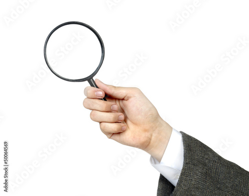 Magnifying glass in hand isolated on white background