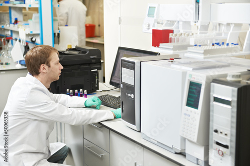 Scientist researcher man works in laboratory