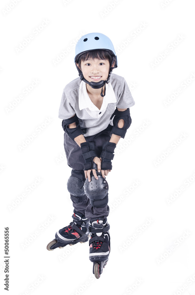 Smart boy playing roller blades over white background