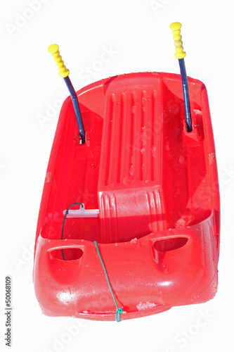 Obraz na plátně red plastic bob with metal brake levers for play and to descend