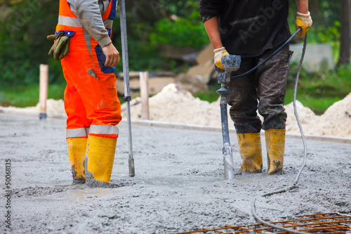 building site compacting concrete photo