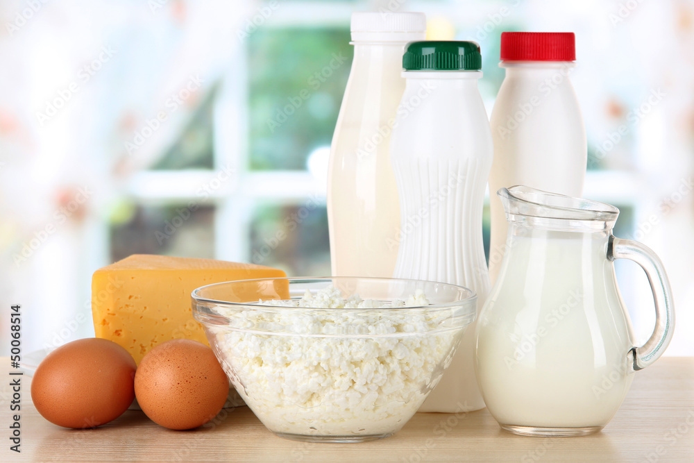 Dairy products and eggs on table in kitchen