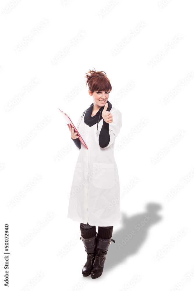 Smiling brunette female doctor with message board Smiling brunette female doctor with message board