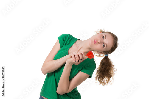 closeup shot of girl with red heart lollipop isolated on white