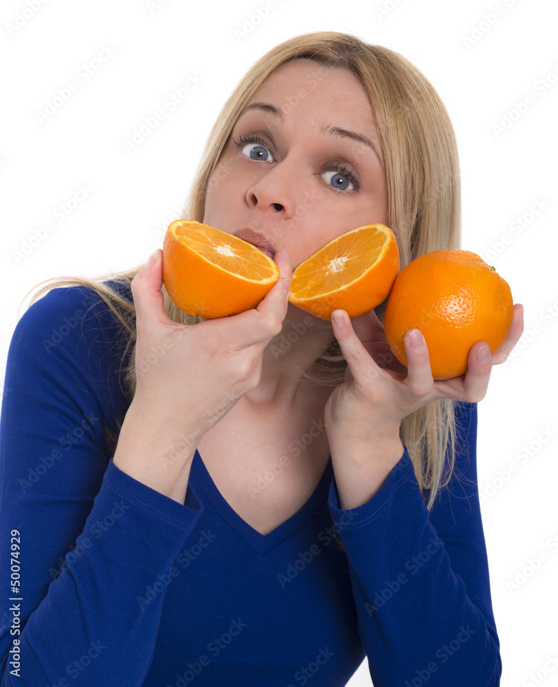 woman eating orange
