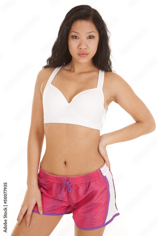 Fototapeta premium Asian woman fitness pink shorts serious