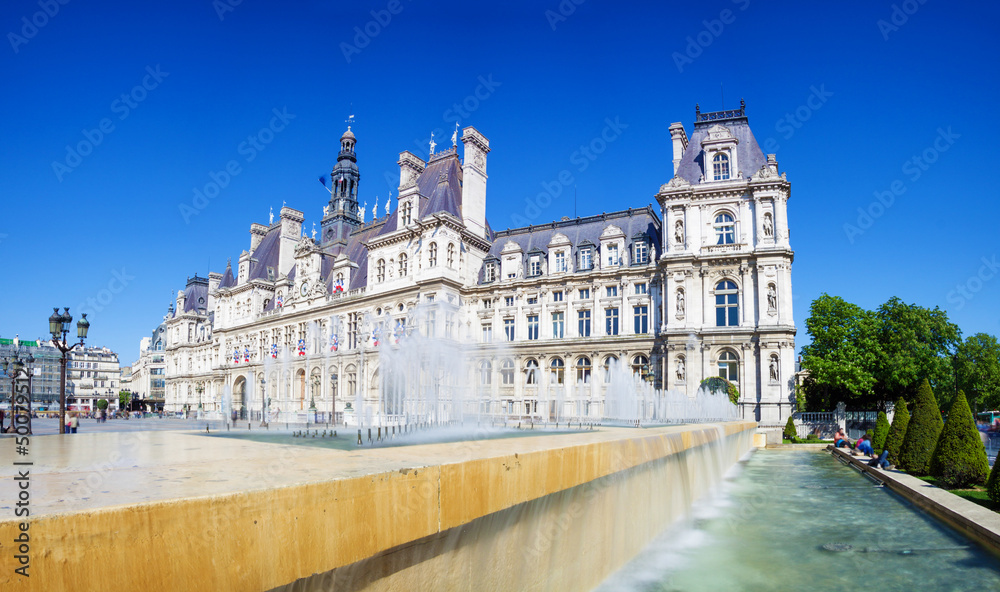 Panoramic photo of Paris City Hall (Hotel de ville) with fountai