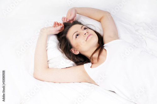 girl lying in bed
