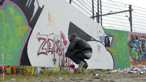 Running graffiti artist