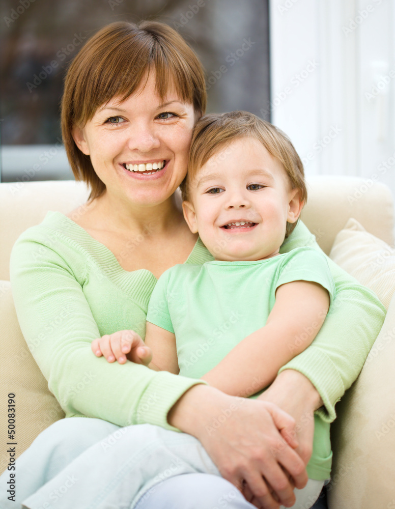 Mother is having fun with her son Mother is having fun with her son