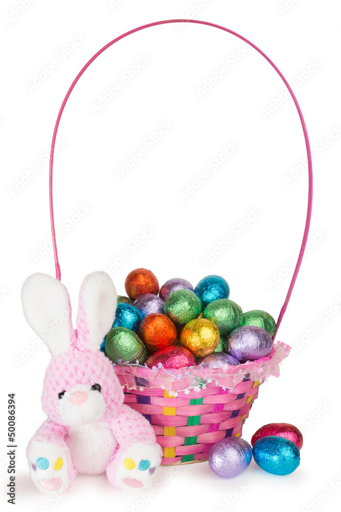A Bunny and a Basket with Chocolate Easter Eggs