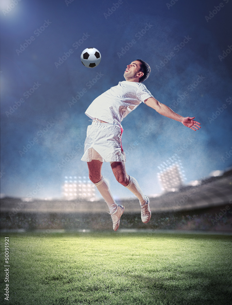 football player striking the ball football player striking the ball