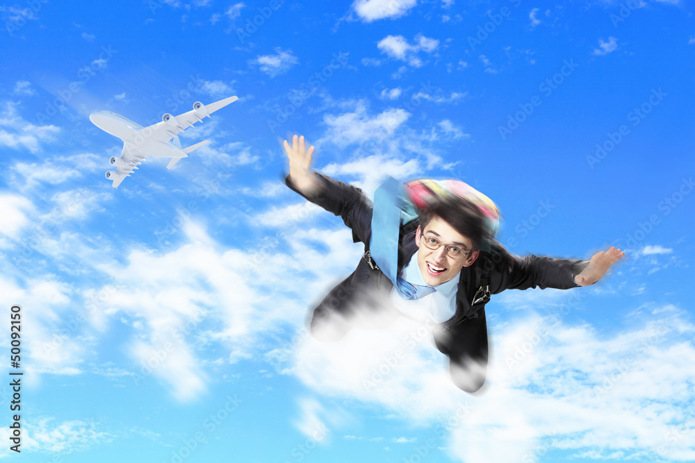 Young businessman flying with parachute on back Young businessman flying with parachute on back