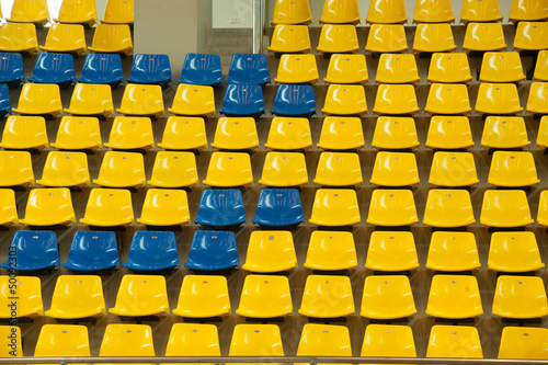 Seats in basketball stadium .