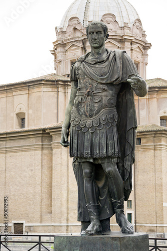 Statue of emperator Julius Caesar in Rome, Italy photo