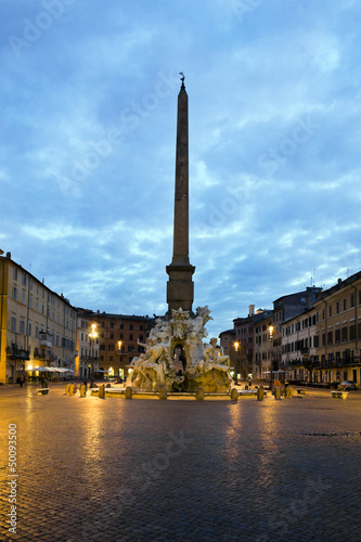 Sunrise and view of Bernini fountain in Piazza Navona, Italy