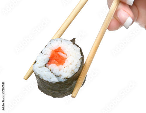 female hand holding sushi