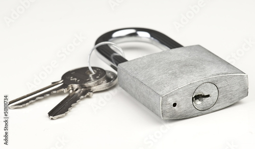 Used gray closed padlock with keys