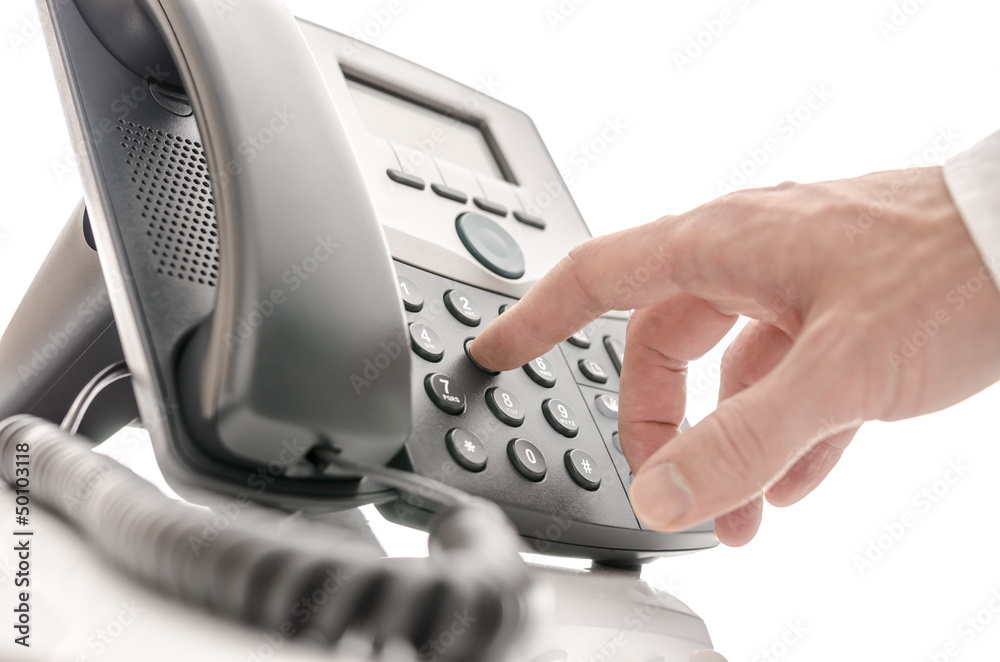 Operator dialing a phone number Operator dialing a phone number