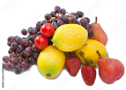 Still life of grape lemons pears strawberry on white background