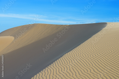 Sand dune and blue sky