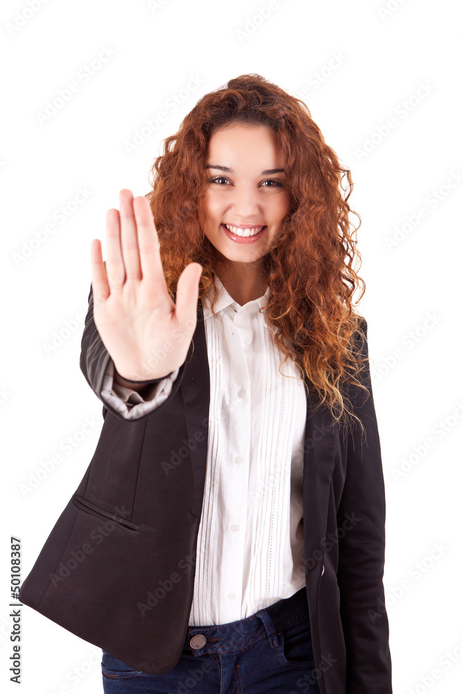 Smiling woman doing STOP sign Smiling woman doing STOP sign