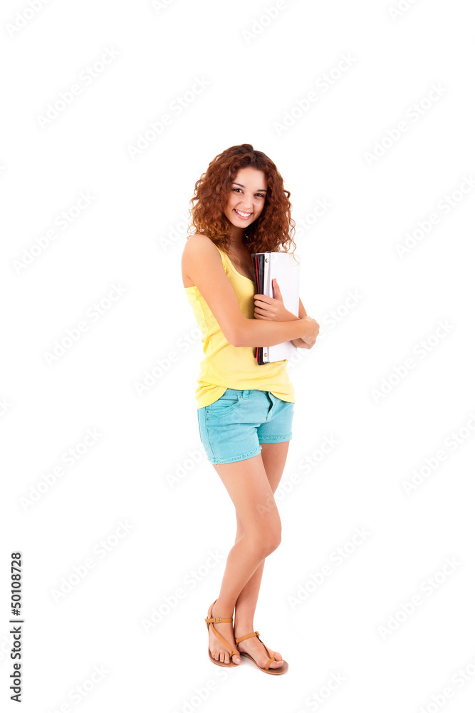 College girl holding books and smiling College girl holding books and smiling