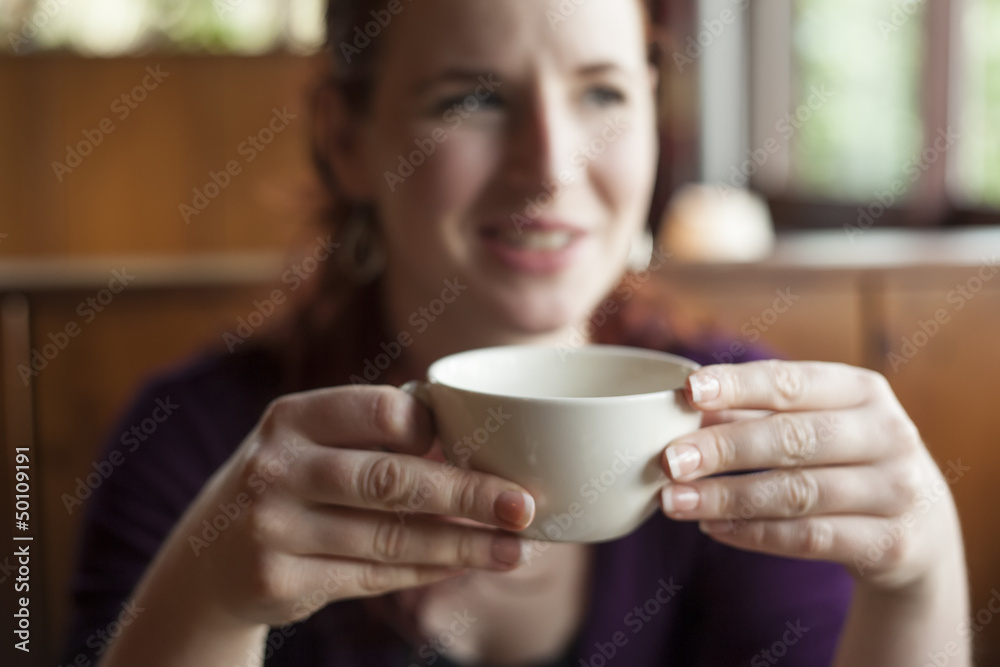 Woman Holding Her Morning Cup of Coffee Woman Holding Her Morning Cup of Coffee