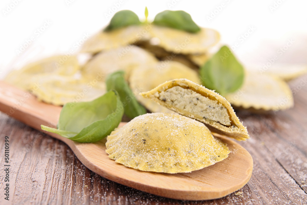 raw ravioli and basil