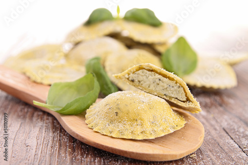 raw ravioli and basil