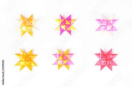 set of handmade flowers made from ribbons