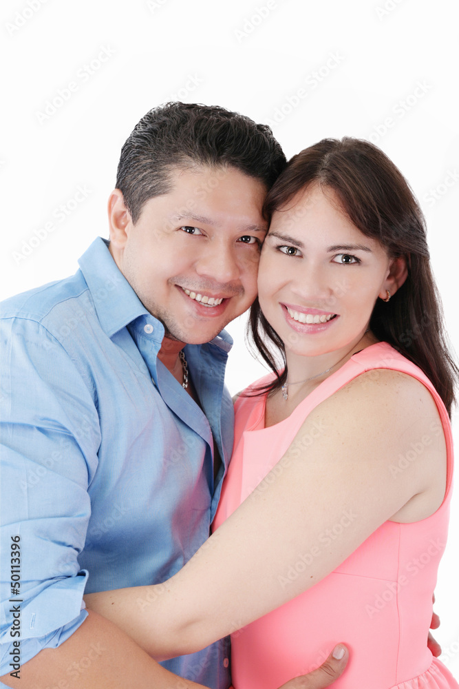 Happy smiling couple looking together at camera Happy smiling couple looking together at camera