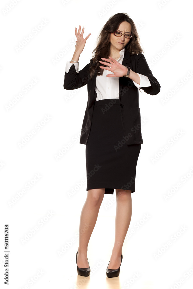 worried business woman looking at the clock on white background worried business woman looking at the clock on white background