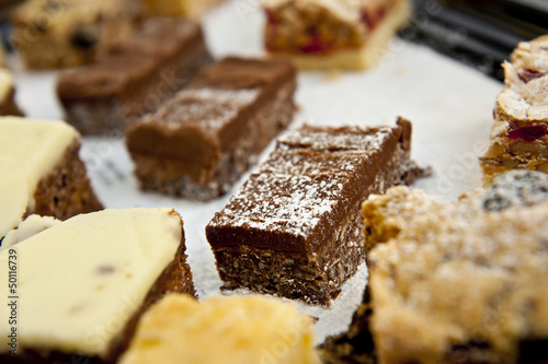 a tray of homemade baked goods, featuring chocolate brownie