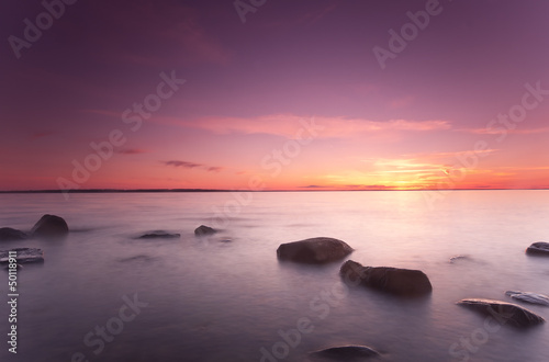 Beautiful ocean sunrise, wide angle photo
