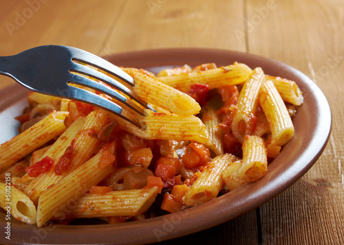 Italian Penne rigate pasta photo