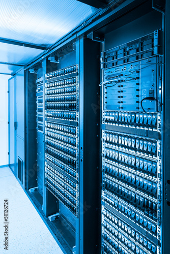 server cabinets inside data center room