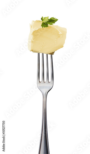 Butter mit Petersilie auf Gabel